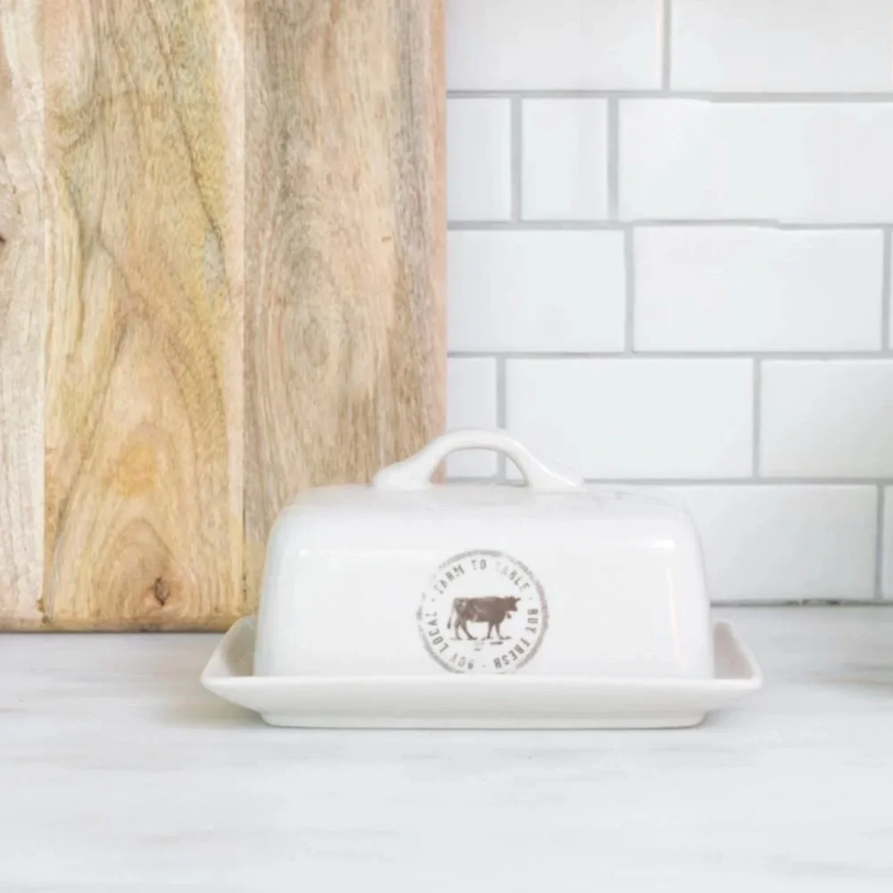 Creative Co-Op White Ceramic Butter Dish with Cow Design